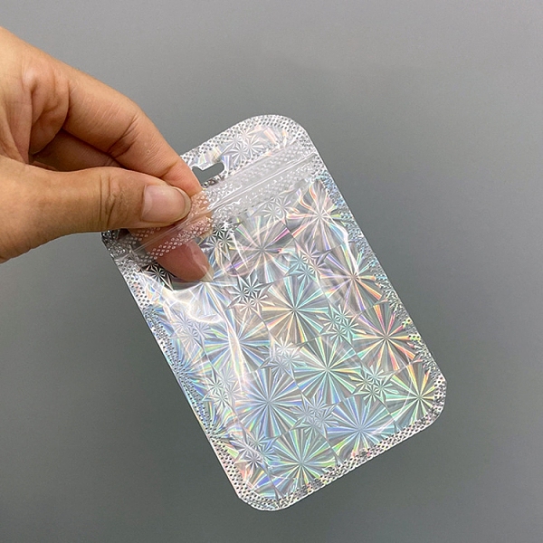 PandaHall Rectangle Laser Plastic Zip Lock Gift Bags, Self Sealing Reclosable Package Pouches for Pen Keychain Watch Storage, Silver, 11x7cm...
PandaHall Rectangle Laser Plastic Zip Lock Gift Bags, Self Sealing Reclosable Package Pouches for Pen Keychain Watch Storage, Silver, 11x7cm...