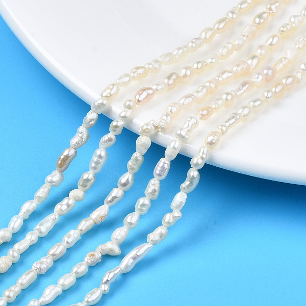 PandaHall Natural Cultured Freshwater Pearl Beads Strands, Rice, Seashell Color, 2.5~8x2.5~3.5mm, Hole: 0.6mm, about 69~75pcs/strand, 13.98...
PandaHall Natural Cultured Freshwater Pearl Beads Strands, Rice, Seashell Color, 2.5~8x2.5~3.5mm, Hole: 0.6mm, about 69~75pcs/strand, 13.98...