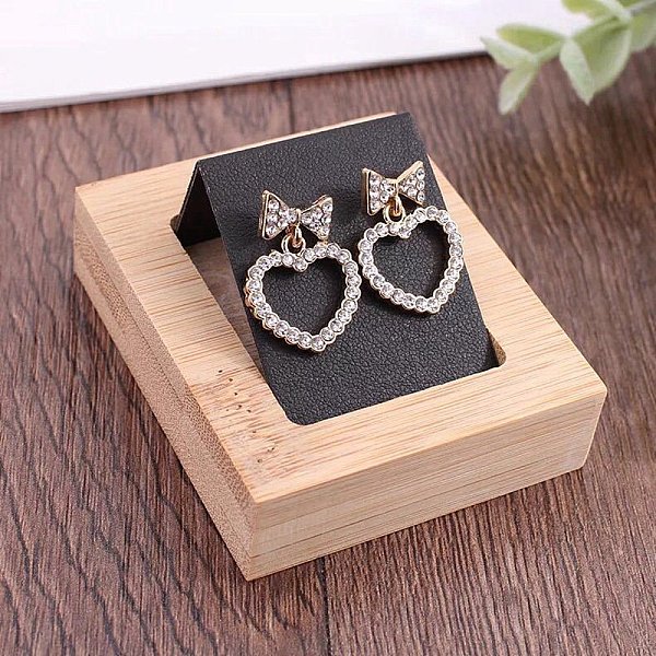 PandaHall Rectangle Wood Earring Display Stands, with Slanted Iron Coverd with PU Leather Holder for Single Pair Earring Showing, Black...
PandaHall Rectangle Wood Earring Display Stands, with Slanted Iron Coverd with PU Leather Holder for Single Pair Earring Showing, Black...