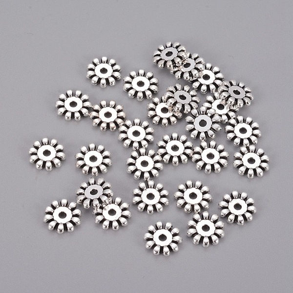 PandaHall Tibetan Style Snowflake Spacer Beads, Lead Free and Cadmium Free, Antique Silver, about 10mm in diameter, 2mm thick, hole: 1.5mm...
PandaHall Tibetan Style Snowflake Spacer Beads, Lead Free and Cadmium Free, Antique Silver, about 10mm in diameter, 2mm thick, hole: 1.5mm...