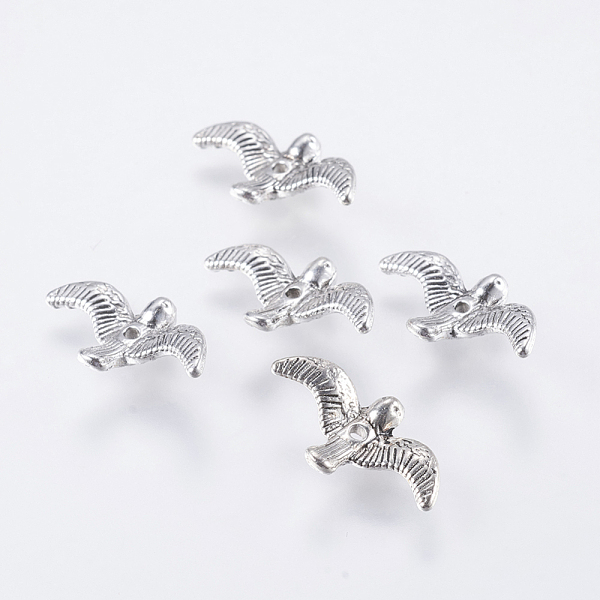 PandaHall Tibetan Style Alloy Beads, Lead Free and Cadmium Free, Bird, Antique Silver, 17mm long, 10mm wide, 2mm thick, hole: 1mm Alloy Bird
PandaHall Tibetan Style Alloy Beads, Lead Free and Cadmium Free, Bird, Antique Silver, 17mm long, 10mm wide, 2mm thick, hole: 1mm Alloy Bird