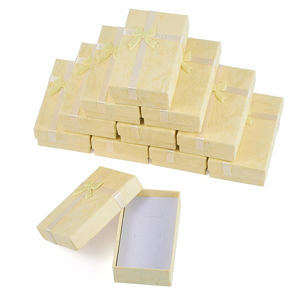 PandaHall Cardboard Bracelet Storage Boxes, Rectangle with Bowknot, Light Yellow, 8.1x5.05x2.8cm Paper Rectangle
PandaHall Cardboard Bracelet Storage Boxes, Rectangle with Bowknot, Light Yellow, 8.1x5.05x2.8cm Paper Rectangle