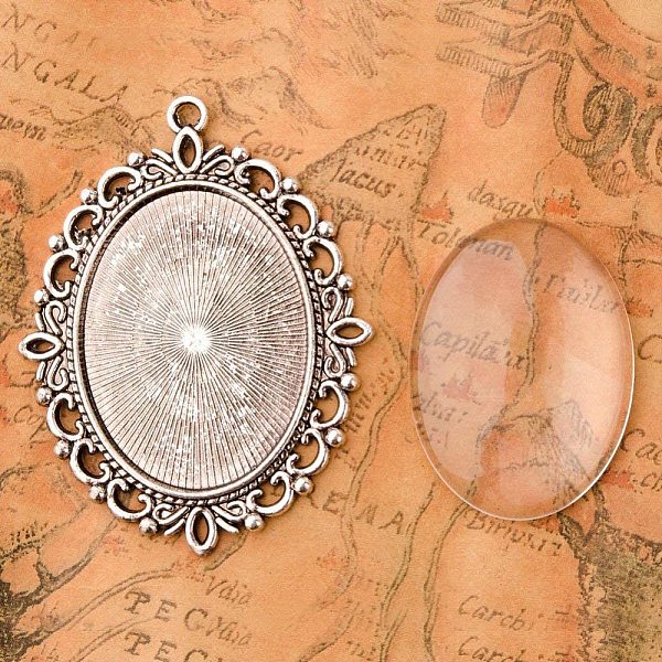 PandaHall 1 Box Oval Clear Glass Cabochon Cover Tibetan Style Pendant Cabochon Settings Antique Silver Pendant Making for DIY Jewellery...
PandaHall 1 Box Oval Clear Glass Cabochon Cover Tibetan Style Pendant Cabochon Settings Antique Silver Pendant Making for DIY Jewellery...