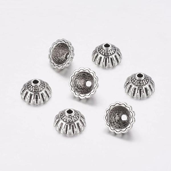 PandaHall Tibetan Style Alloy Bead Caps, Lead Free & Cadmium Free, Cone, Antique Silver, about 10mm in diameter, 5.5mm thick, hole: 1.5mm...
PandaHall Tibetan Style Alloy Bead Caps, Lead Free & Cadmium Free, Cone, Antique Silver, about 10mm in diameter, 5.5mm thick, hole: 1.5mm...