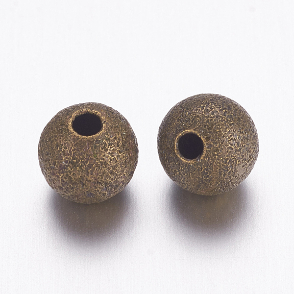 PandaHall Brass Textured Beads, Nickel Free, Round, Antique Bronze Color, Size: about 6mm in diameter, hole: 1mm Brass Round
PandaHall Brass Textured Beads, Nickel Free, Round, Antique Bronze Color, Size: about 6mm in diameter, hole: 1mm Brass Round