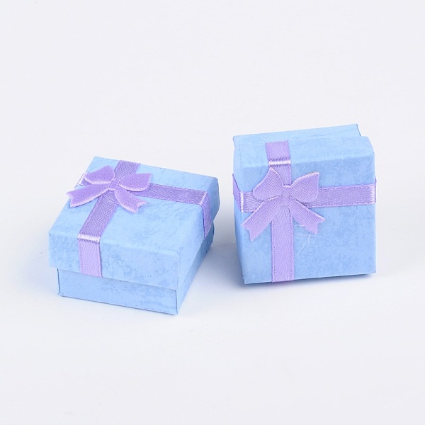 PandaHall Cardboard Ring Boxes, with Satin Ribbons Bowknot outside, Square, Cornflower Blue, 41x41x26mm Paper Square Blue
PandaHall Cardboard Ring Boxes, with Satin Ribbons Bowknot outside, Square, Cornflower Blue, 41x41x26mm Paper Square Blue