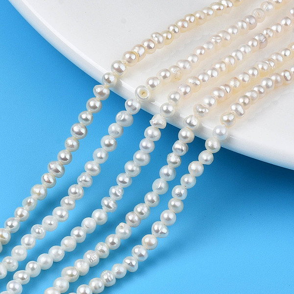PandaHall Natural Cultured Freshwater Pearl Beads Strands, Potato, Seashell Color, 2.5~3.5mm, Hole: 0.6mm, about 127~130pcs/strand, 13.78...
PandaHall Natural Cultured Freshwater Pearl Beads Strands, Potato, Seashell Color, 2.5~3.5mm, Hole: 0.6mm, about 127~130pcs/strand, 13.78...