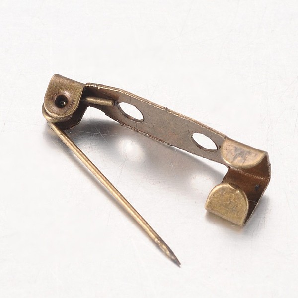 PandaHall Nickel Free Antique Bronze Iron Pin Backs Brooch Safety Pin Findings, 20mm long, 5mm wide, 5mm thick, Hole: about 2mm Iron
PandaHall Nickel Free Antique Bronze Iron Pin Backs Brooch Safety Pin Findings, 20mm long, 5mm wide, 5mm thick, Hole: about 2mm Iron