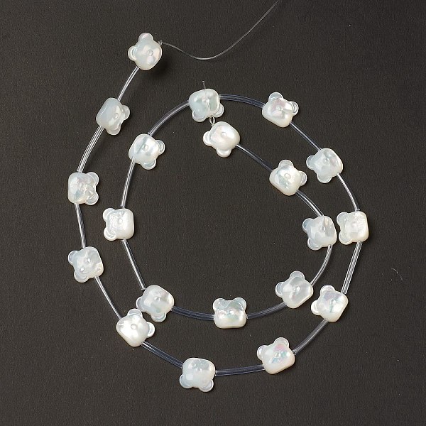 PandaHall Natural White Shell Mother of Pearl Shell Beads, Bear Head, Creamy White, 9.5x10.5x3.5mm, Hole: 0.9mm, about 20pcs/strand, 18.90''...
PandaHall Natural White Shell Mother of Pearl Shell Beads, Bear Head, Creamy White, 9.5x10.5x3.5mm, Hole: 0.9mm, about 20pcs/strand, 18.90''...