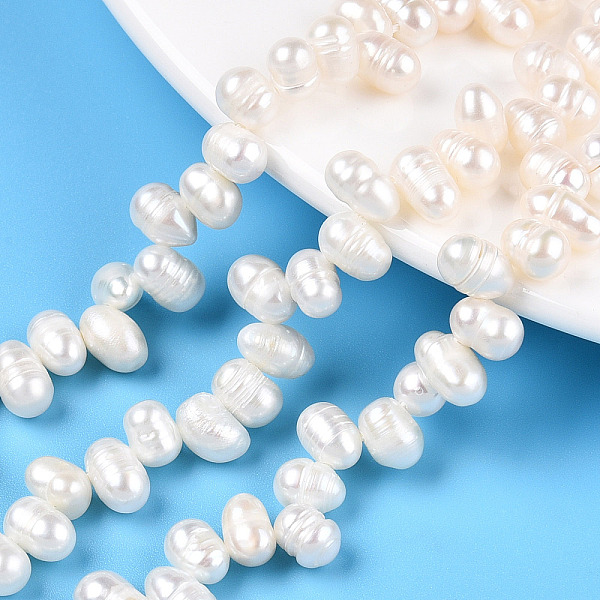 PandaHall Natural Cultured Freshwater Pearl Beads Strands, Potato, Top Drilled, Creamy White, 5~5.5x5~5.5mm, Hole: 0.8mm, about...
PandaHall Natural Cultured Freshwater Pearl Beads Strands, Potato, Top Drilled, Creamy White, 5~5.5x5~5.5mm, Hole: 0.8mm, about...