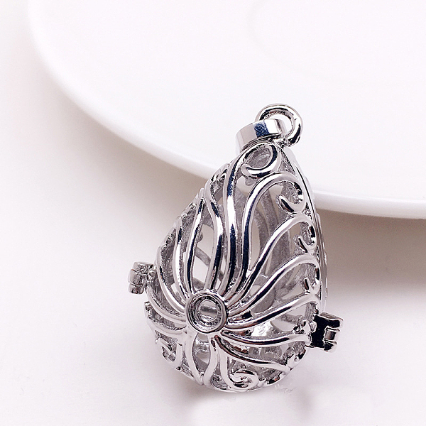 PandaHall Brass Bead Cage Pendants, for Chime Ball Pendant Necklaces Making, Hollow, Teardrop with Sea Grass Charm, Platinum, No Size Brass...
PandaHall Brass Bead Cage Pendants, for Chime Ball Pendant Necklaces Making, Hollow, Teardrop with Sea Grass Charm, Platinum, No Size Brass...