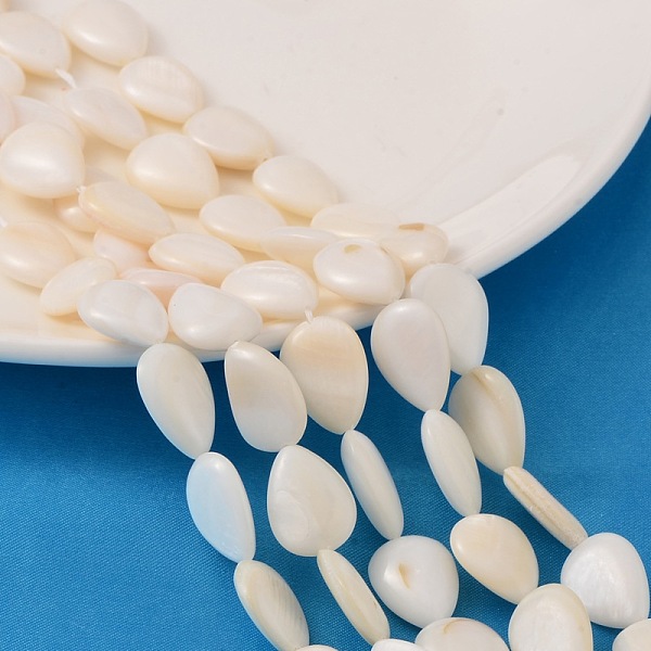 PandaHall Natural White Shell Beads Strands, Mother of Pearl Shell Beads, teardrop, White, 16.5~17.5x12.5x4~5, Hole: 1mm, about 21pcs/strand...
PandaHall Natural White Shell Beads Strands, Mother of Pearl Shell Beads, teardrop, White, 16.5~17.5x12.5x4~5, Hole: 1mm, about 21pcs/strand...