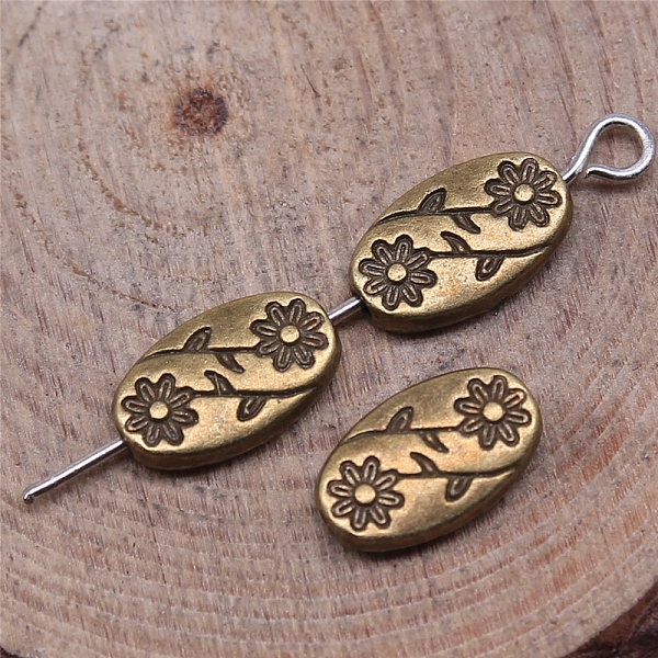 PandaHall Tibetan Style Alloy Beads, Oval with Flower, Antique Bronze, 10x6x3mm Alloy Oval
PandaHall Tibetan Style Alloy Beads, Oval with Flower, Antique Bronze, 10x6x3mm Alloy Oval