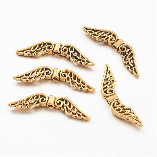 PandaHall Tibetan Style Alloy Beads, Wing, Antique Golden, 7.5x30x3mm, Hole: 1mm Alloy Wing
PandaHall Tibetan Style Alloy Beads, Wing, Antique Golden, 7.5x30x3mm, Hole: 1mm Alloy Wing
