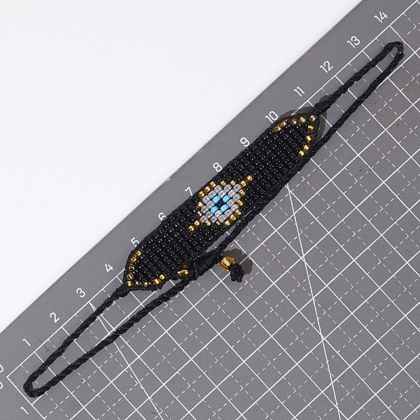 PandaHall Bohemian Style Beaded Devil Eye Bracelet for Women, Imported from Source. Glass
PandaHall Bohemian Style Beaded Devil Eye Bracelet for Women, Imported from Source. Glass