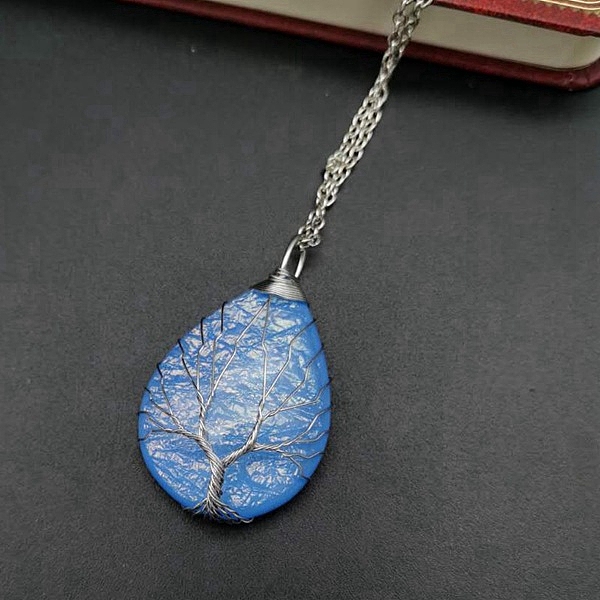 PandaHall Teardrop with Tree Resin Pendant Necklace, Platinum Copper Wire Wrapped Necklace, Light Sky Blue, 20.47 inch(52cm) Resin
PandaHall Teardrop with Tree Resin Pendant Necklace, Platinum Copper Wire Wrapped Necklace, Light Sky Blue, 20.47 inch(52cm) Resin