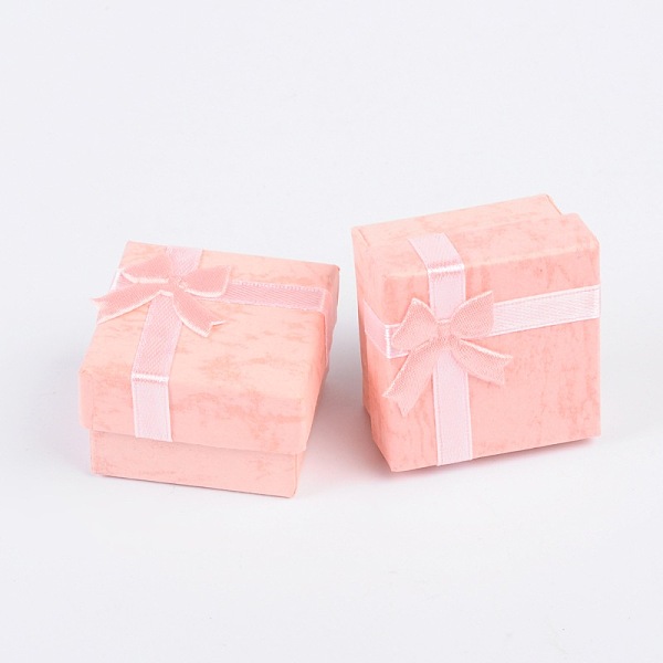 PandaHall Cardboard Ring Boxes, with Satin Ribbons Bowknot outside, Square, Pink, 41x41x26mm Paper Square Pink
PandaHall Cardboard Ring Boxes, with Satin Ribbons Bowknot outside, Square, Pink, 41x41x26mm Paper Square Pink