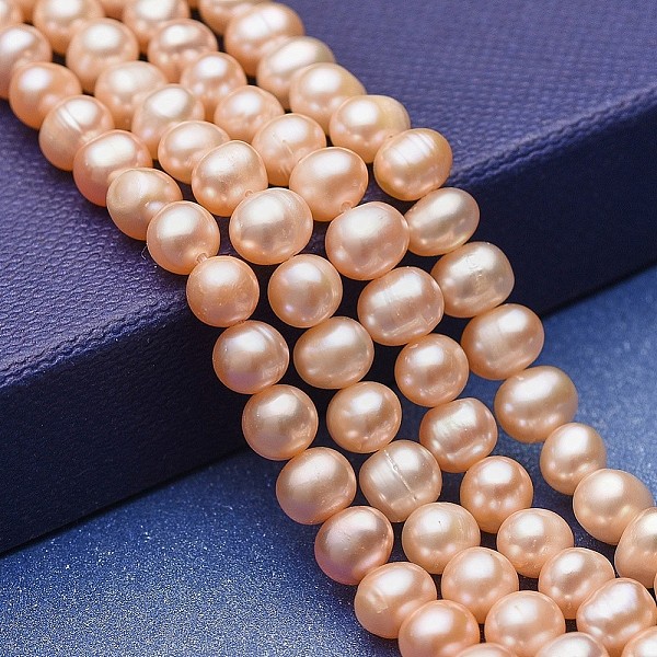 PandaHall Natural Cultured Freshwater Pearl Beads Strands, Potato, Bisque, 5.5~7x5~6mm, Hole: 0.6mm, about 66pcs/strand, 14.17 inch(36cm)..., Orange
PandaHall Natural Cultured Freshwater Pearl Beads Strands, Potato, Bisque, 5.5~7x5~6mm, Hole: 0.6mm, about 66pcs/strand, 14.17 inch(36cm)..., Orange