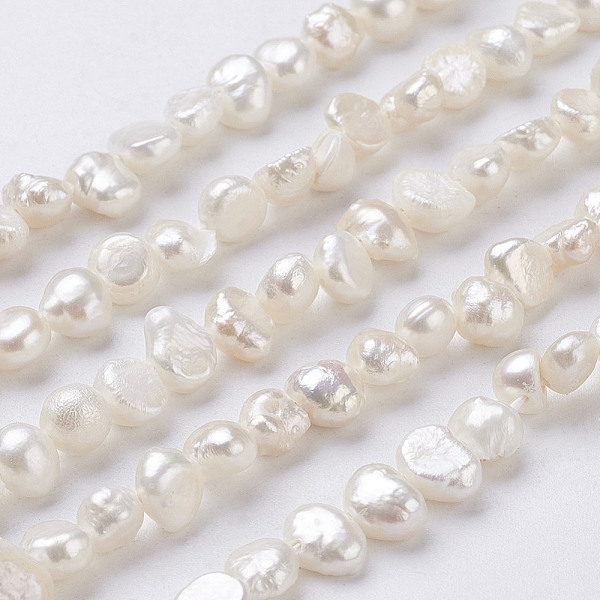 PandaHall Natural Cultured Freshwater Pearl Beads Strands, Nuggets, Seashell Color, 6~9x5~6x3~4mm, Hole: 0.5mm, about 62~63pcs/strand, 13.4...
PandaHall Natural Cultured Freshwater Pearl Beads Strands, Nuggets, Seashell Color, 6~9x5~6x3~4mm, Hole: 0.5mm, about 62~63pcs/strand, 13.4...