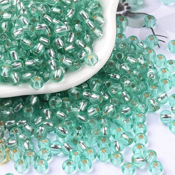 PandaHall 6/0 Glass Seed Beads, Silver Lined Round Hole, Round, Turquoise, 4x3mm, Hole: 1.2mm, about 6925pcs/pound Glass Green
PandaHall 6/0 Glass Seed Beads, Silver Lined Round Hole, Round, Turquoise, 4x3mm, Hole: 1.2mm, about 6925pcs/pound Glass Green