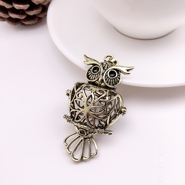 PandaHall Brass Bead Cage Pendants, Hollow Owl Charms, for Chime Ball Pendant Necklaces Making, Antique Bronze, 18mm Brass Owl
PandaHall Brass Bead Cage Pendants, Hollow Owl Charms, for Chime Ball Pendant Necklaces Making, Antique Bronze, 18mm Brass Owl