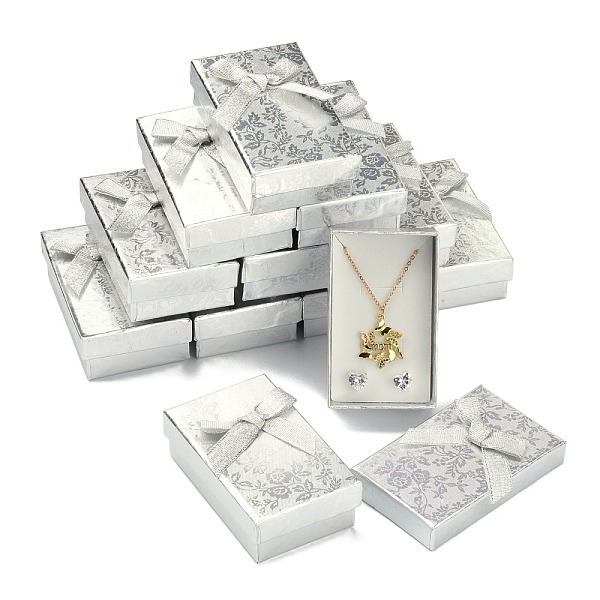 PandaHall Rectangle Cardboard Jewelry Set Boxes, 2 Slots, with Bowknot Outside and Sponge Inside, for Rings and Earrings, Silver, 83x53x27mm...
PandaHall Rectangle Cardboard Jewelry Set Boxes, 2 Slots, with Bowknot Outside and Sponge Inside, for Rings and Earrings, Silver, 83x53x27mm...