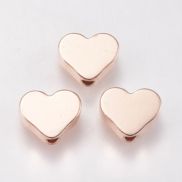 

PandaHall Brass Beads, Heart, Rose Gold, 6.5x8x2.5mm, Hole: 1.5mm Brass Heart