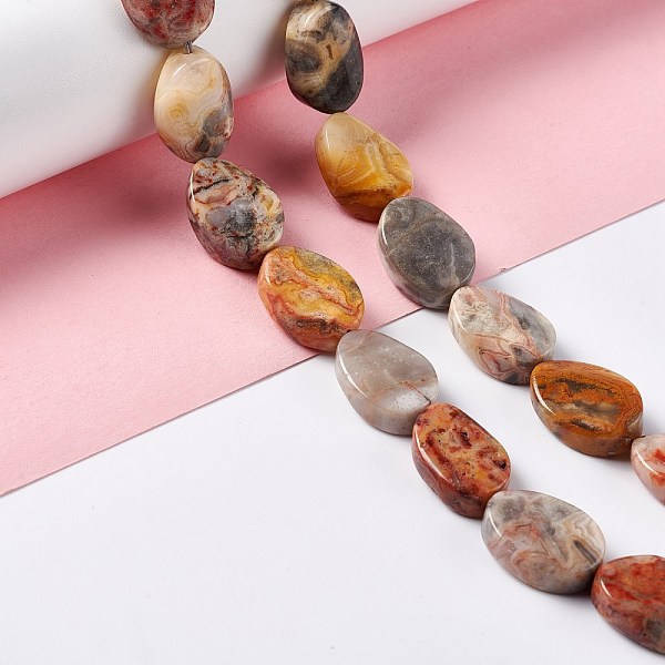 

PandaHall Natural Crazy Agate Beads Strands, Twist Oval, 17.5~18.5x12.5~13.5x5.5~6.5mm, Hole: 1mm, about 23pcs/strand, 15.43''~16.22''...
