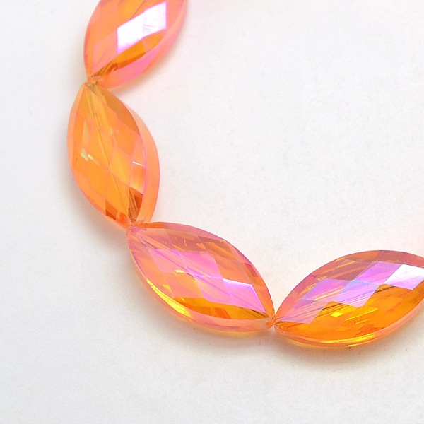 

PandaHall Electroplate Crystal Glass Horse Eye Beads Strands, Faceted, Rainbow Color Plated, Coral, 25x12x8mm, Hole: 1mm, about 30pcs/strand..., Red