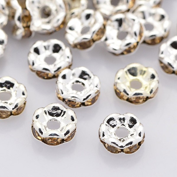

PandaHall Brass Rhinestone Spacer Beads, Grade A, Wavy Edge, Silver Color Plated, Rondelle, Light Colorado Topaz, 6x3mm, Hole: 1mm..., Yellow