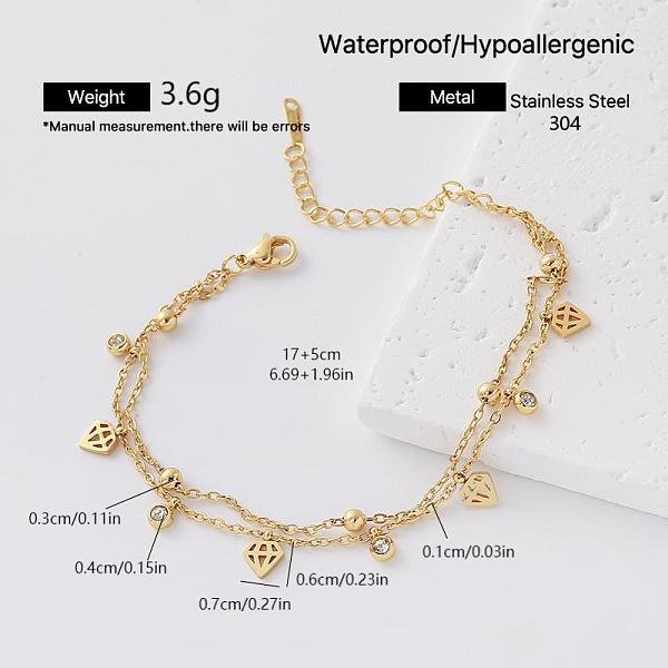 Bracciale a un filo da donna in acciaio inossidabile 304 con ciondoli in pavé di zirconi cubici trasparenti.