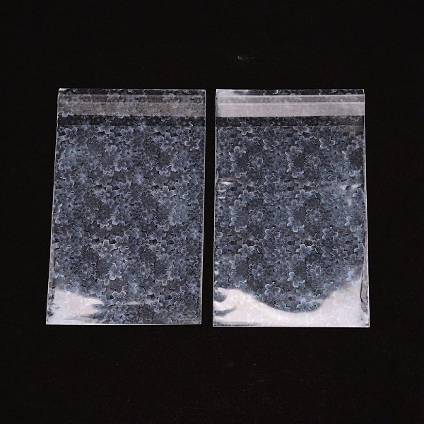 

PandaHall Laser OPP Plastic Bags, Cellophane Bags, for Jewelry Packing, Rectangle, Flower Pattern, 110x65x0.1mm, 50pcs/bag OPP Cellophane...