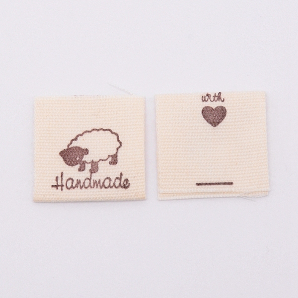 

PandaHall Cotton Sewing Labels, Cloth Labels, for Sewing, Knitting, Crafts, Word Handmade, Khaki, Animal Pattern, 39x21x0.3mm Cotton Other..., Yellow