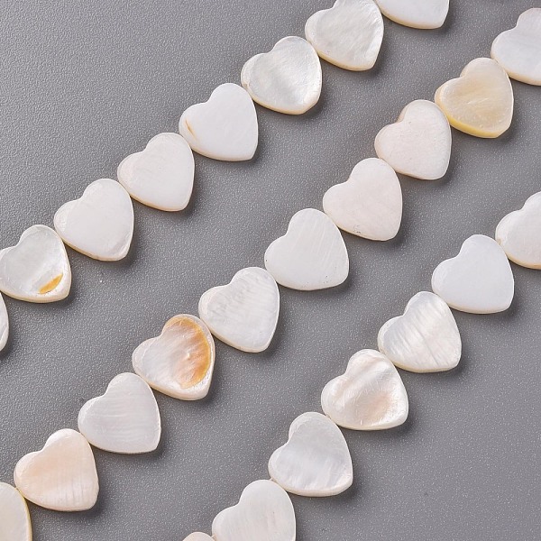

PandaHall Natural Freshwater Shell Beads Strands, Heart, Creamy White, 10.5x10.5x3mm, Hole: 1mm, about 33pcs/strand, 13.78 inch(35cm)...