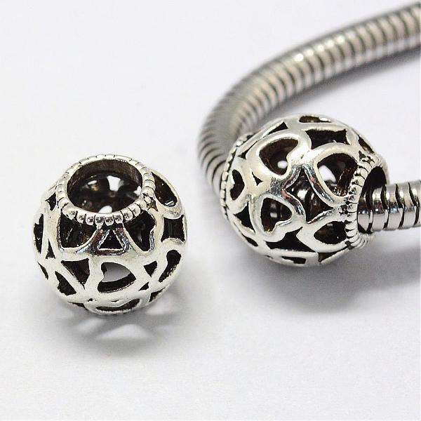 

PandaHall Alloy European Beads, Tibetan Style, Large Hole Beads, Rondelle with Heart, Hollow, Antique Silver, 11x11mm, Hole: 5mm Alloy...