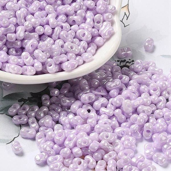 

PandaHall Glass Seed Beads, Peanut, Plum, 5.5~6x3~3.5x3mm, Hole: 1~1.2mm, about 4000pcs/pound Glass Peanut Purple
