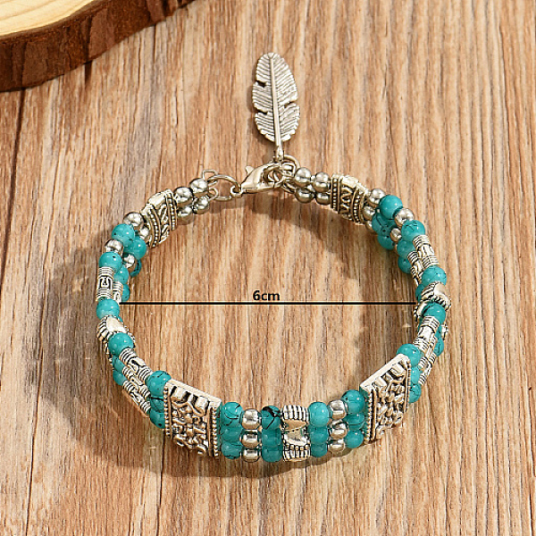 

PandaHall Synthetic Turquoise Beaded Triple Layer Multi-strand Bracelet, with Zinc Alloy Feather Charms, Turquoise, Inner Diameter: 2-3/8..., Green