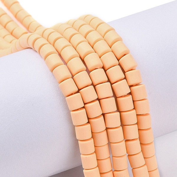 

PandaHall Handmade Polymer Clay Bead Strands, Column, Champagne Yellow, 6.5x6mm, Hole: 1.2mm, about 61pcs/strand, 15.75 inch(40cm) Polymer...