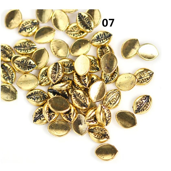 PandaHall Textured Alloy Cabochons, Nail Art Decoration Accessories for Women, Cowrie Shell Shape, Antique Golden, 5.8x4.3x1.6mm, about...