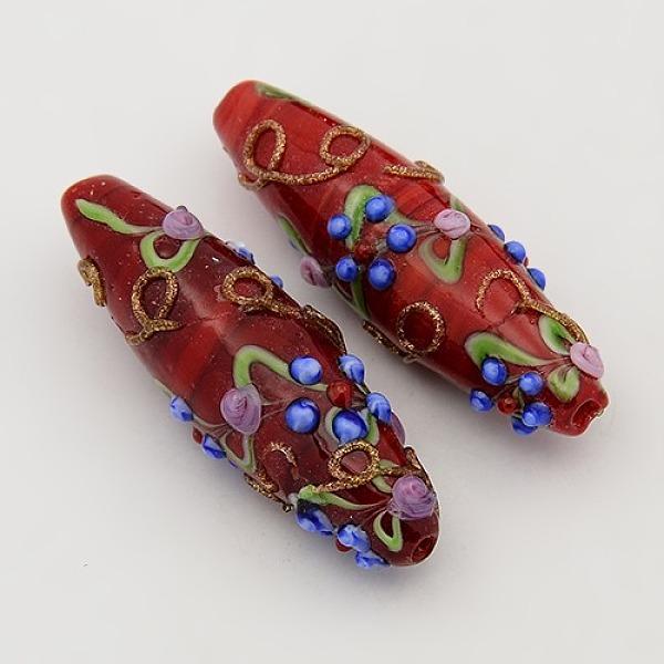 

PandaHall Handmade Bumpy Lampwork Rice Beads Strands, with Flower Pattern, Red, 40~45x13~15mm, Hole: 2mm, about 7pcs/strand, 12 inch...