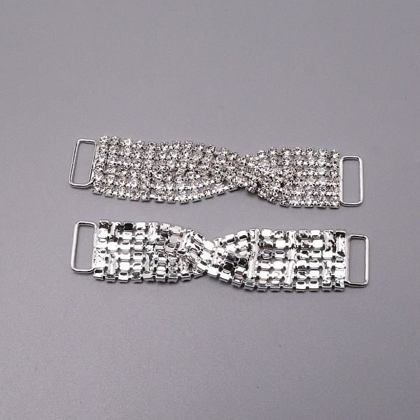 

PandaHall Brass Rhinestone Links Connectors, Garment Accessories, Twsited, Crystal, Silver, 86x18x5mm, Hole: 13x5mm Glass Rhinestone Twist..., Clear