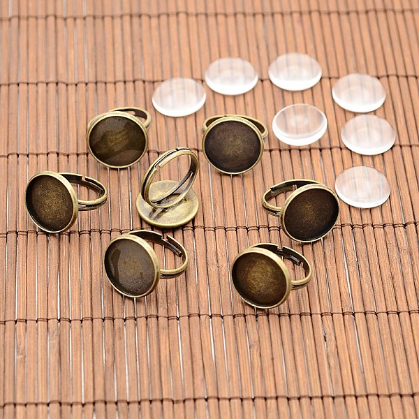 

PandaHall Vintage Brass Ring Components and Clear Glass Cabochons, Nickel Free, Antique Bronze, Tray: 16mm, 17mm, Glass Cabochons...