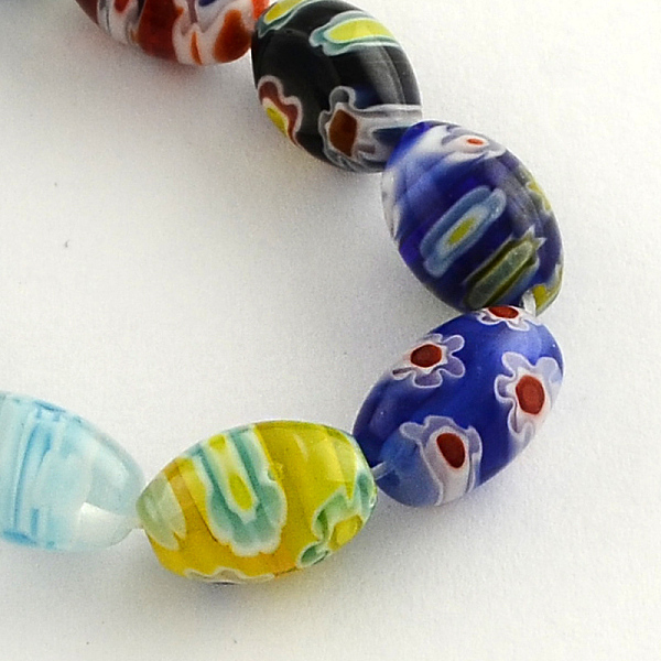 

PandaHall Oval Handmade Millefiori Glass Beads Strands, Mixed Color, 14~15x10mm, Hole: 1mm, about 27pcs/strand, 14.9 inch Millefiori..., Multicolor