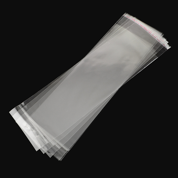 

PandaHall OPP Cellophane Bags, Rectangle, Clear, 31x9cm, Hole: 8mm, Unilateral Thickness: 0.035mm, Inner Measure: 25x9cm OPP Cellophane...