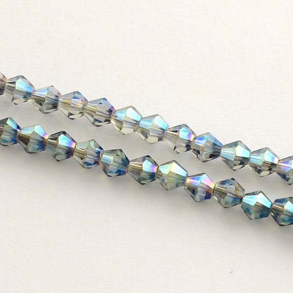 

PandaHall Electroplate Glass Bead Strands, Rainbow Plated, Faceted Bicone, Medium Sea Green, 4x4.5mm, Hole: 1mm, 92~96pcs/strand...