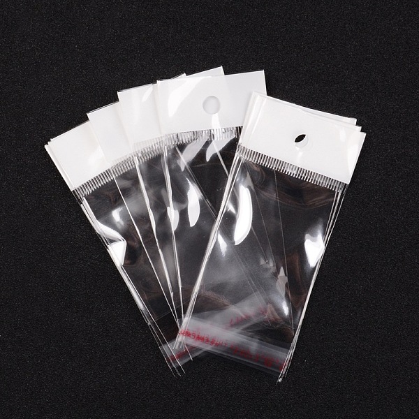 

PandaHall Clear Cellophane Bags, Transparent Opp Bag Packing Plastic Bags Self Adhesive Seal, Inner measure: 6x4cm, Hole: 6mm, Unilateral...