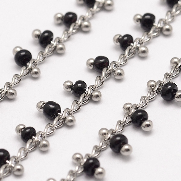 

PandaHall 3.28 Feet Handmade Seed Beaded Chains, Soldered, with Brass Findings, Black, 6x2~3mm Brass+Glass Black
