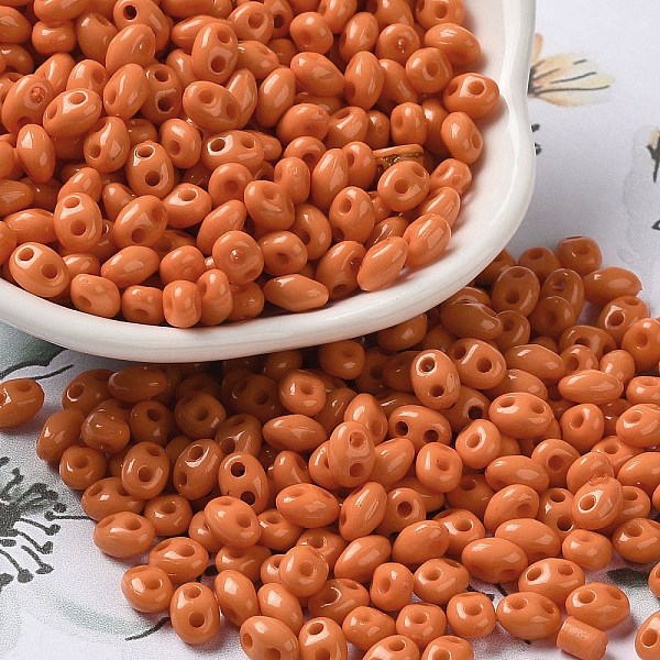

PandaHall Opaque Acrylic Beads, Double Hole, Oval, Dark Orange, 6x4.5x3.3mm, Hole: 1.2mm, about 14516pcs/500g Acrylic Oval
