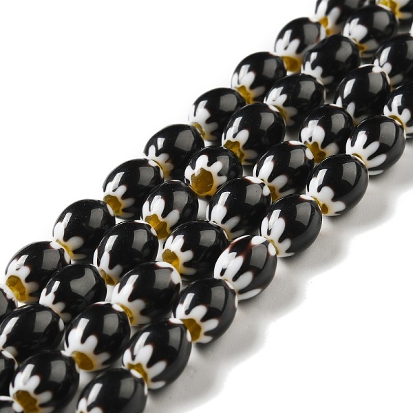 

PandaHall Handmade Lampwork Beads Strands, Oval with Flower, Black, 11.5~12.5x9.5mm, Hole: 1.2mm, about 26~27pcs/strand, 12.99~13.39 inch...