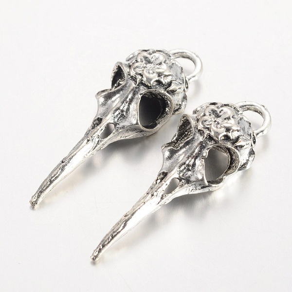 

PandaHall Tibetan Style Alloy Pendants, Raven Skull, Cadmium Free & Lead Free, Antique Silver, 39~42.5x12.5x8mm, Hole: 5x4mm, about...